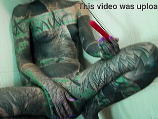 Tattooed model fingers gaping ass in steamy shower