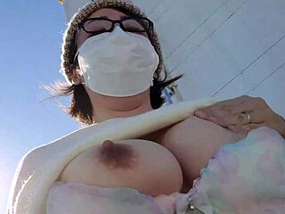 a married woman pleasures herself outside in the garden