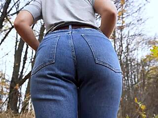 Milf Teases Her Amazing Tight Ass in Blue Jeans During Outdoor Massage