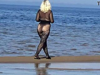 black style flashing on the beach in pantyhose