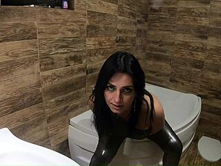 Ripped shiny nylon jumpsuit in the bathroom cum cleanup dirty dancing and pee play