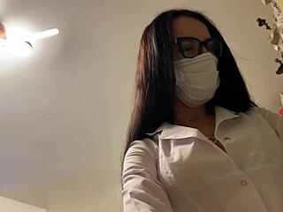 Nurse in latex gloves provides therapy session