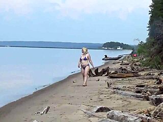 mature blondes walk on the beach in bikinis