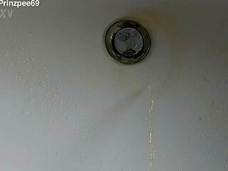 Boy is pissing in the sink and makes stinky farts