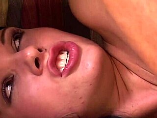dark-haired hottie fucked by two men in the ass