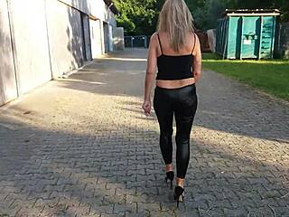 granny walks outside in shiny leggings